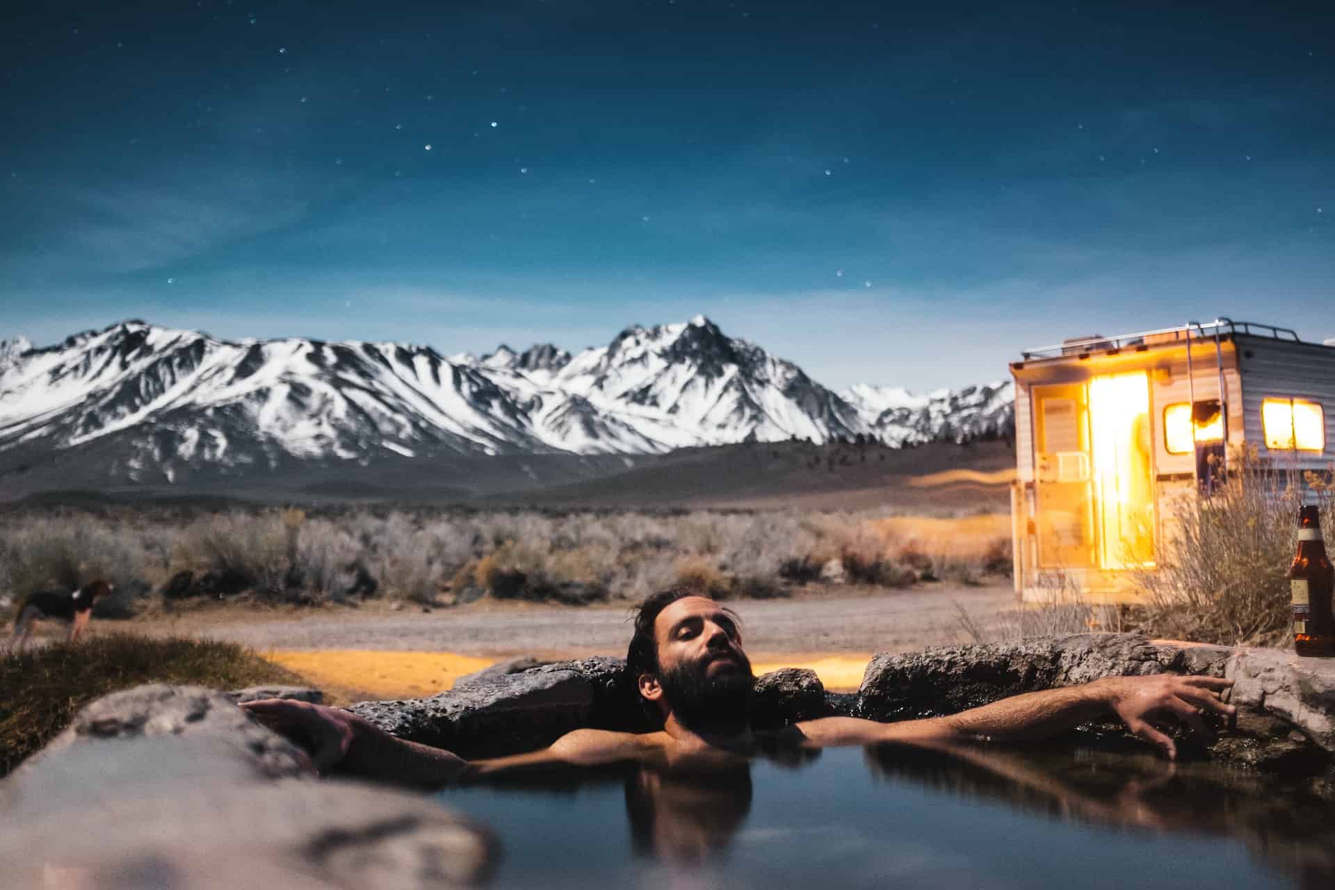 Man relaxing in hot springs
