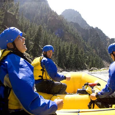 People Smiling while rafting