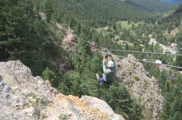 Cliffside ziplining in idaho springs with AVA Rafting & Zipline