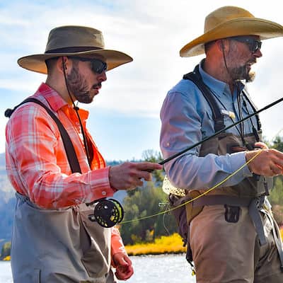 Guide showing guest where to spot fish on the Upper Colorado