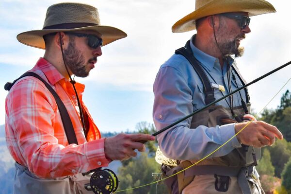 Guide showing guest where to spot fish on the Upper Colorado