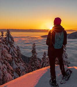 Snowshoeing at sunset