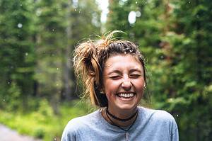 woman smiling outside